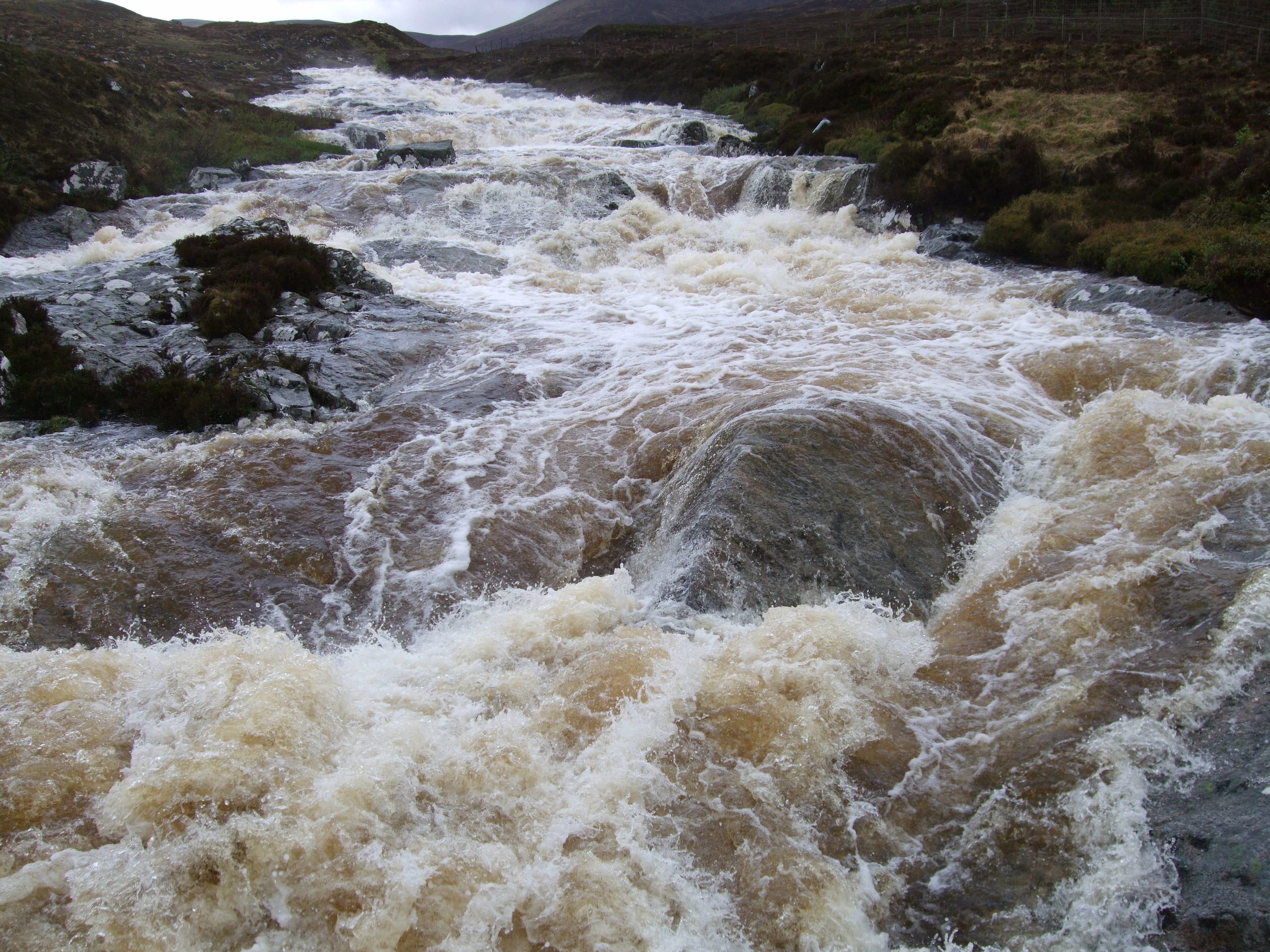 WATER HAZARD: Raging rivers like this can prove impossible to cross during and after heavy rainfall