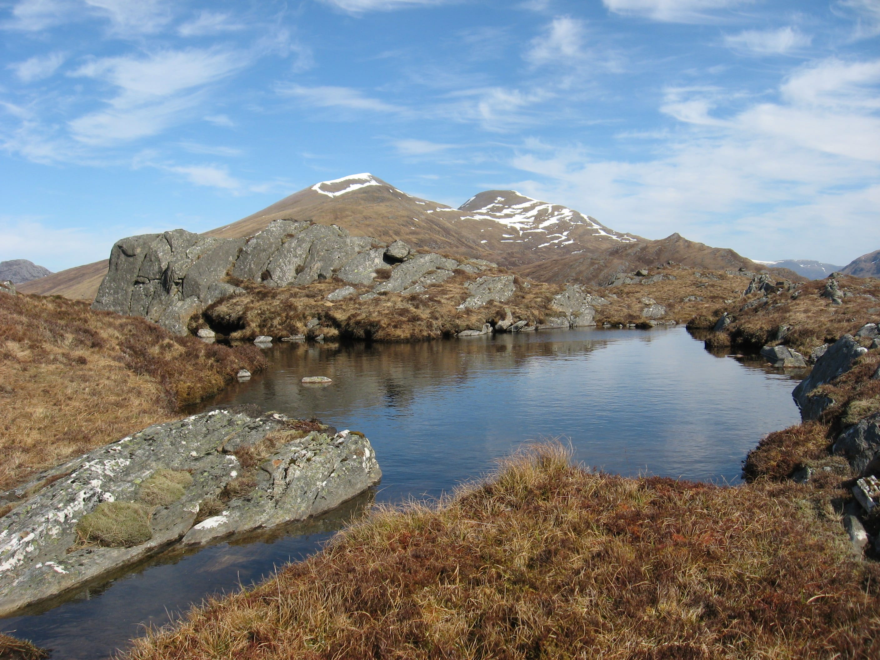 HIGH AND MIGHTY: Looking over to the snow-streaked Easains from the summit area of Creag Ghuanach