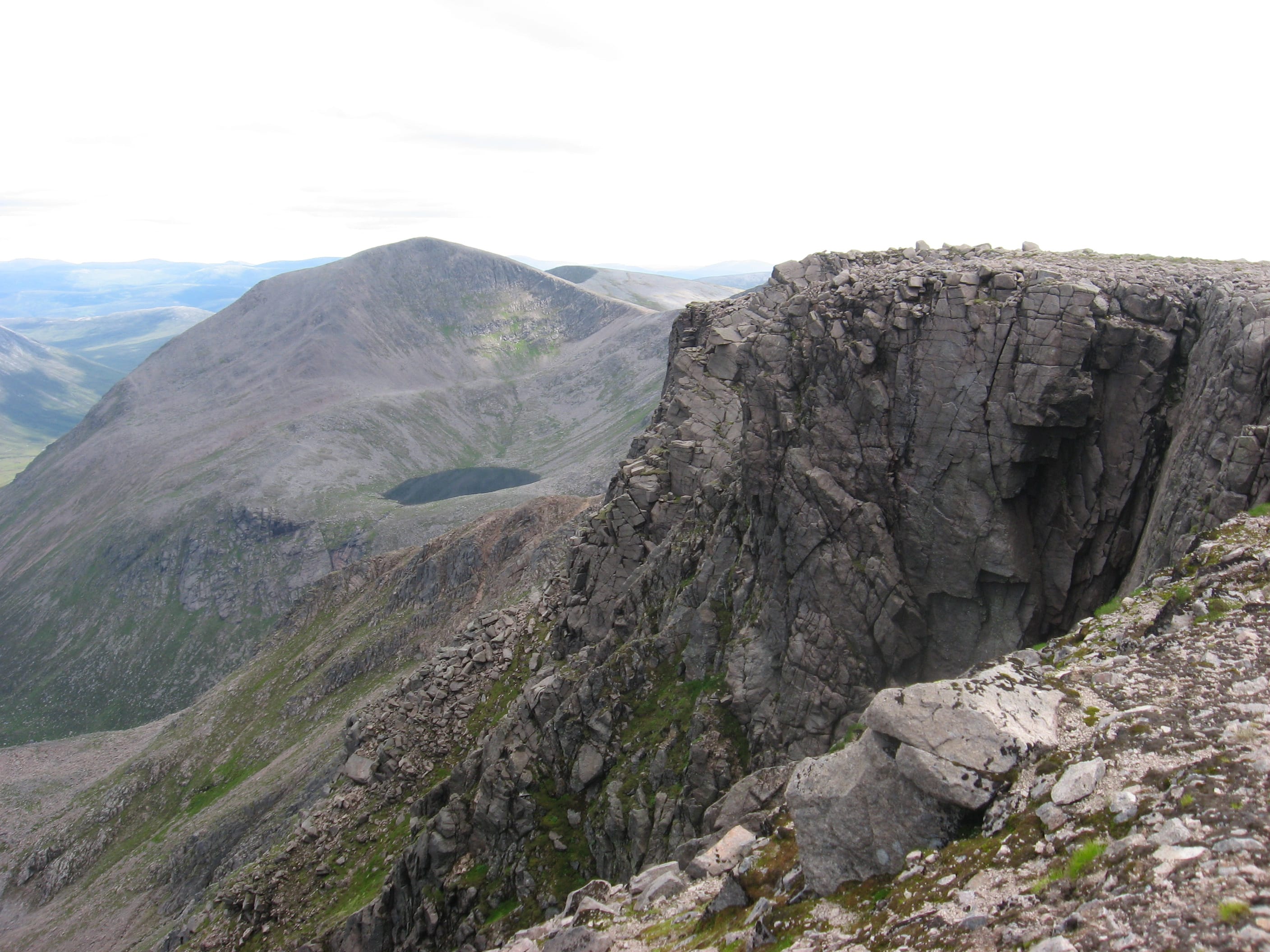VIEW TO A THRILL: Looking over the cliffs of Braeriach to Sgor an Lochain Uaine and Cairn Toul