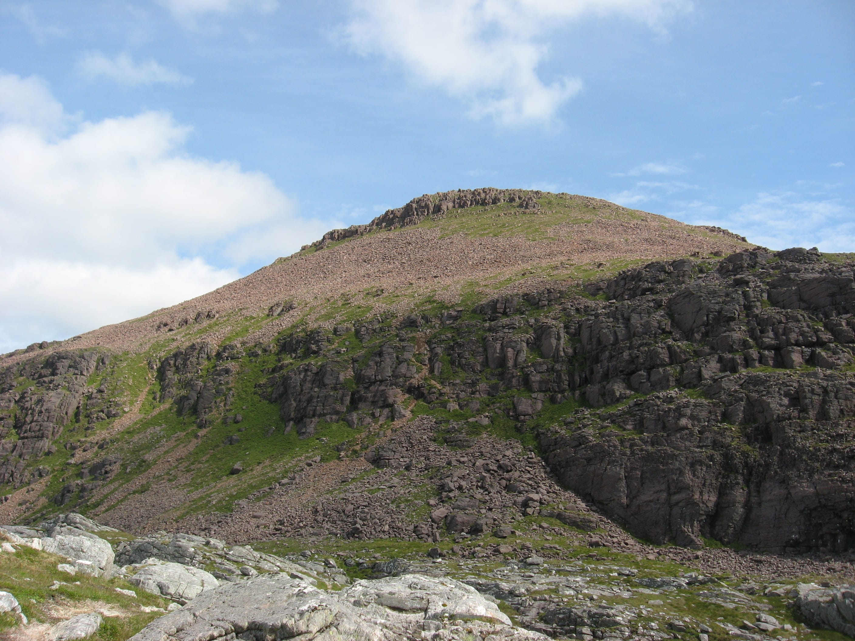 RED AND REMOTE: Stately Ruadh Stac Mor from the ascent of A' Mhaighdean
