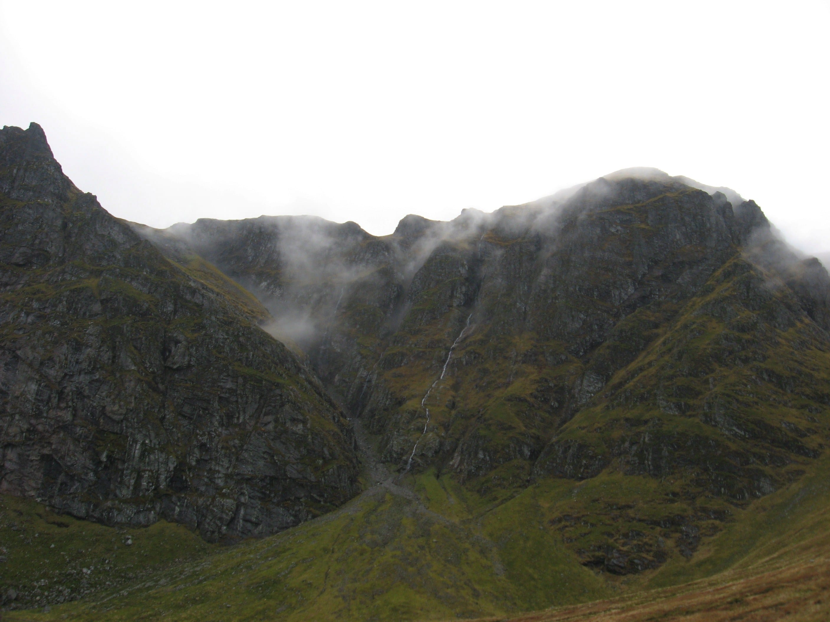 VEIL OF CLOUD: Wispy light mists cling to the tops of the cliffs in Coire Ardair