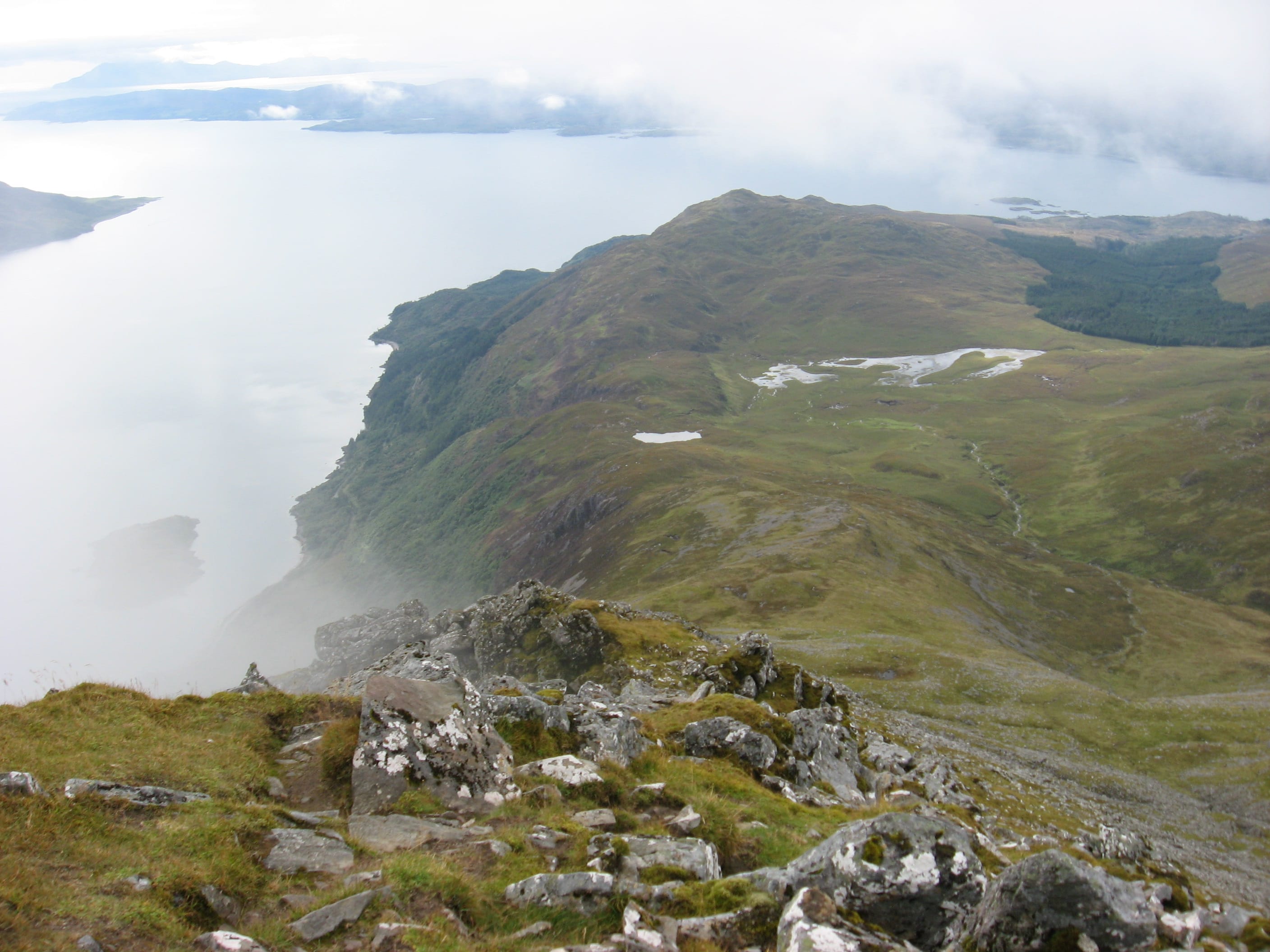 CLOUD AND CLEAR: Looking down the east ridge of Beinn Sgritheall over the misty waters of Loch Hourn