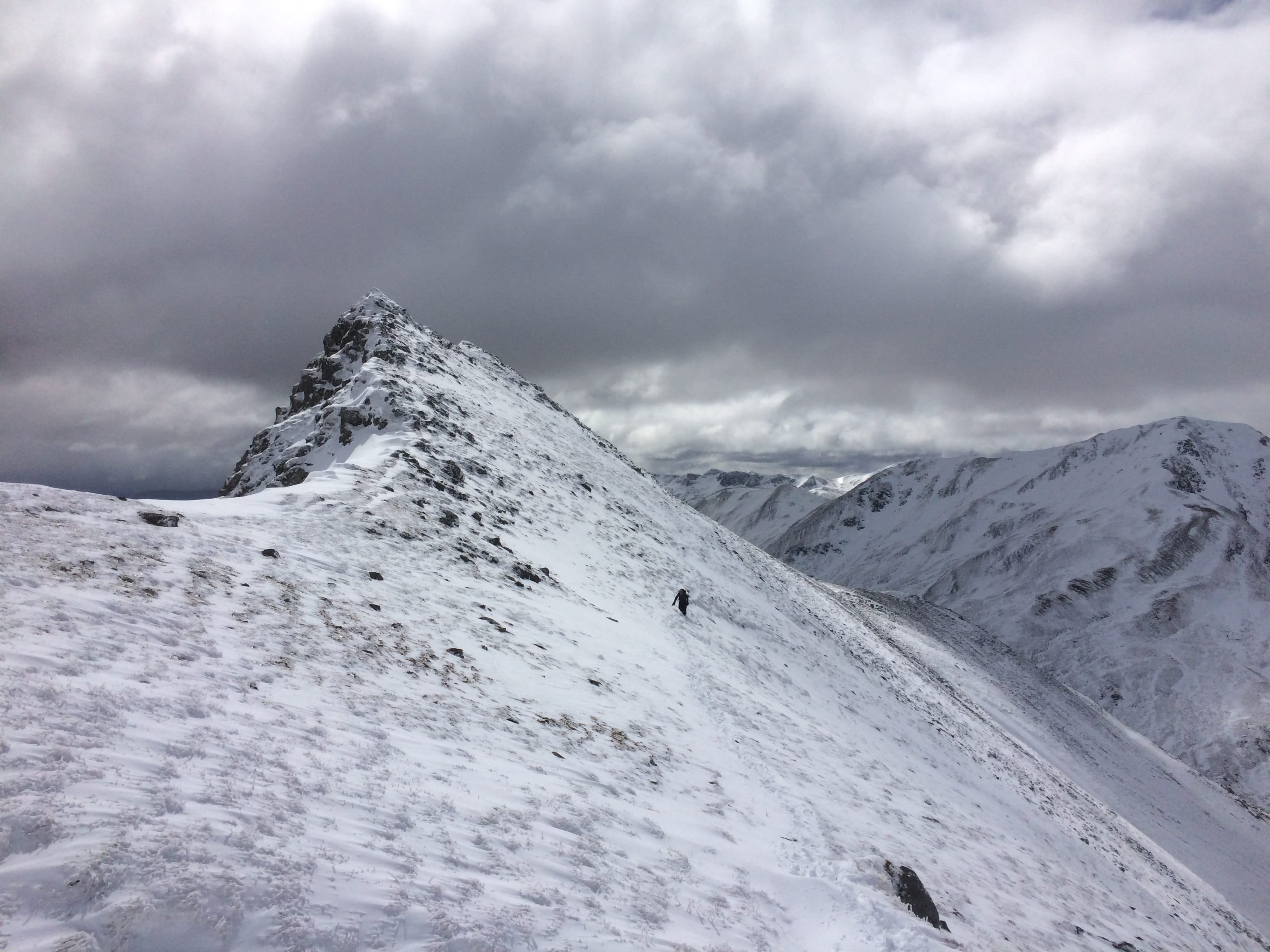 WHITE RIDGE: One of our group cuts a lonely figure as he makes his way up the snow plastered slopes of Ciste Dhubh
