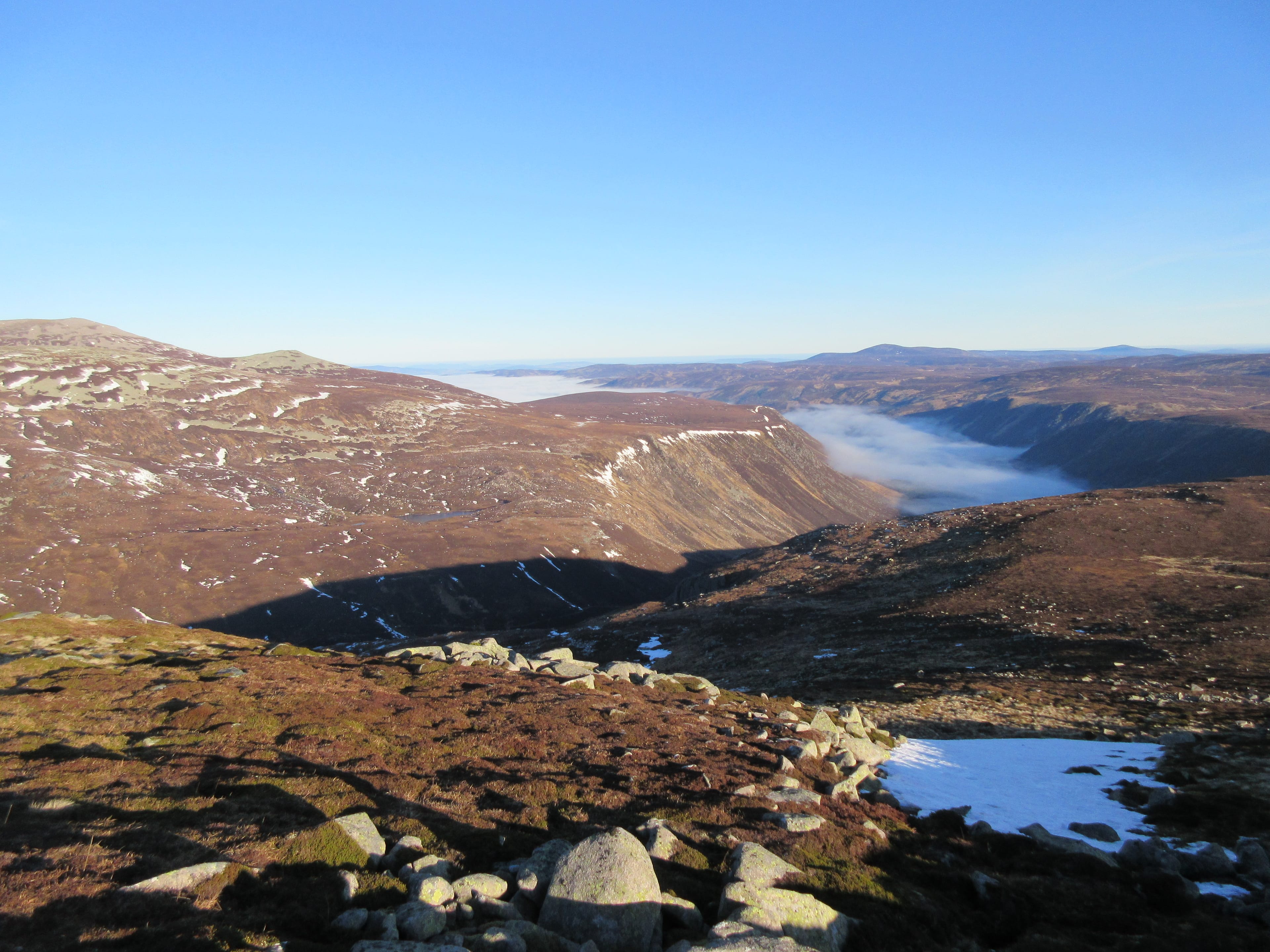 SUNKEN MISTS: An icy cloud layer smothers Loch Muick and the glens in this view from high on the sunnier slopes of Broad Cairn