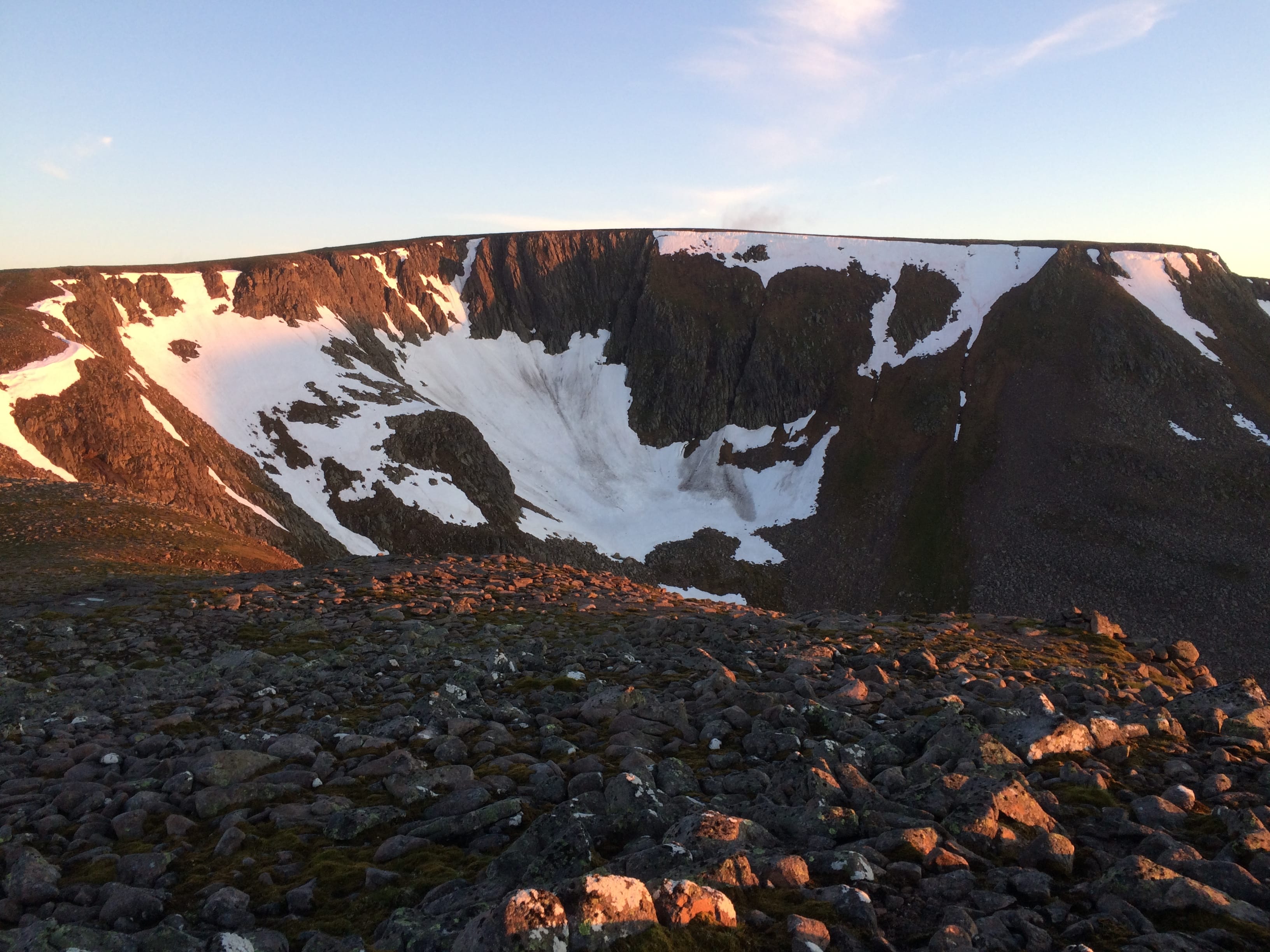 COPPER GLOW: Old snow on the walls of Braeriach's An Garbh Coire contrast with the red wash of the sunrise