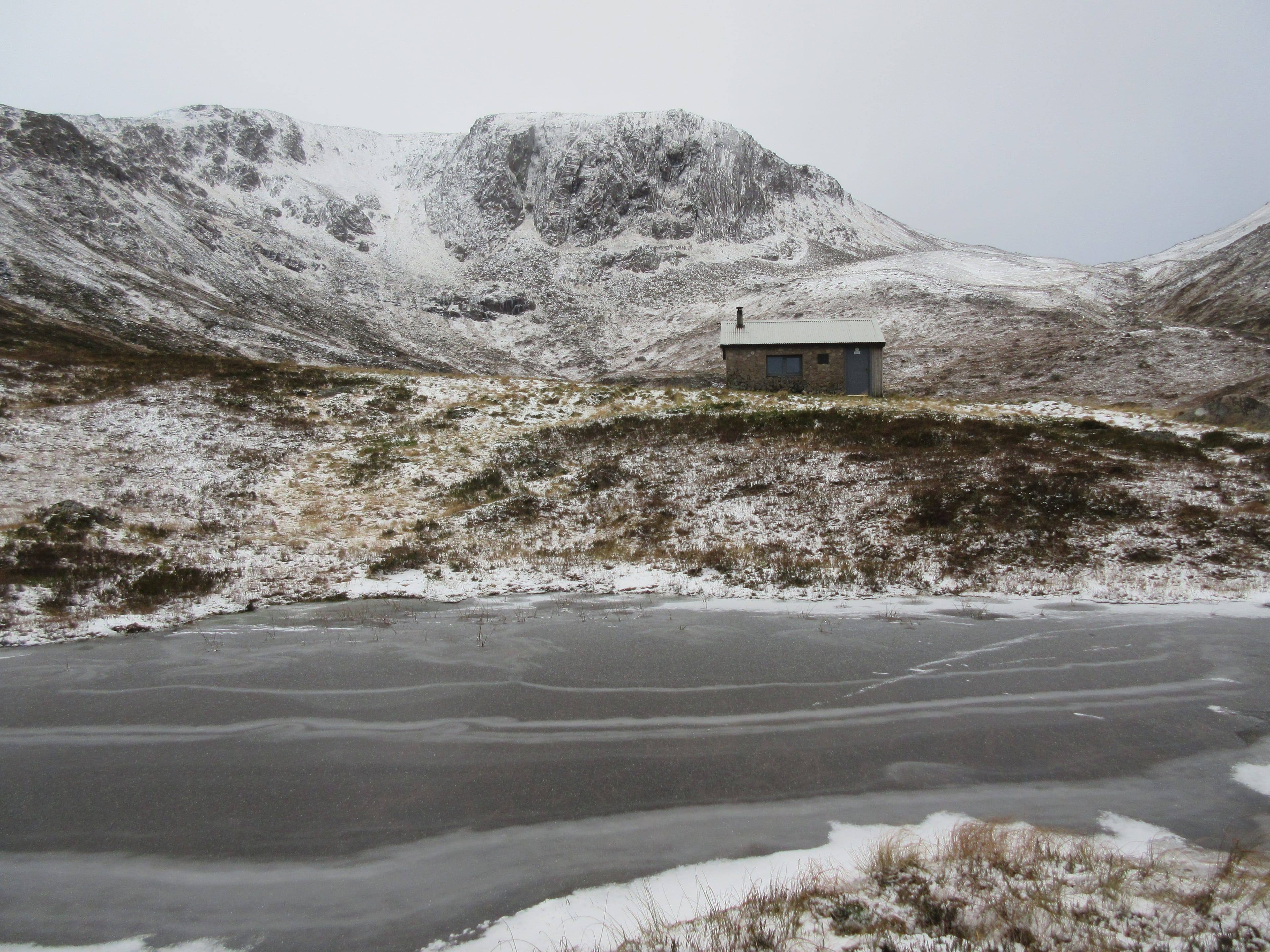 WELCOME REFUGE: The Hutchison Hut, a mere speck in snowy Coire Etchachan, stands out beneath the surrounding rock faces