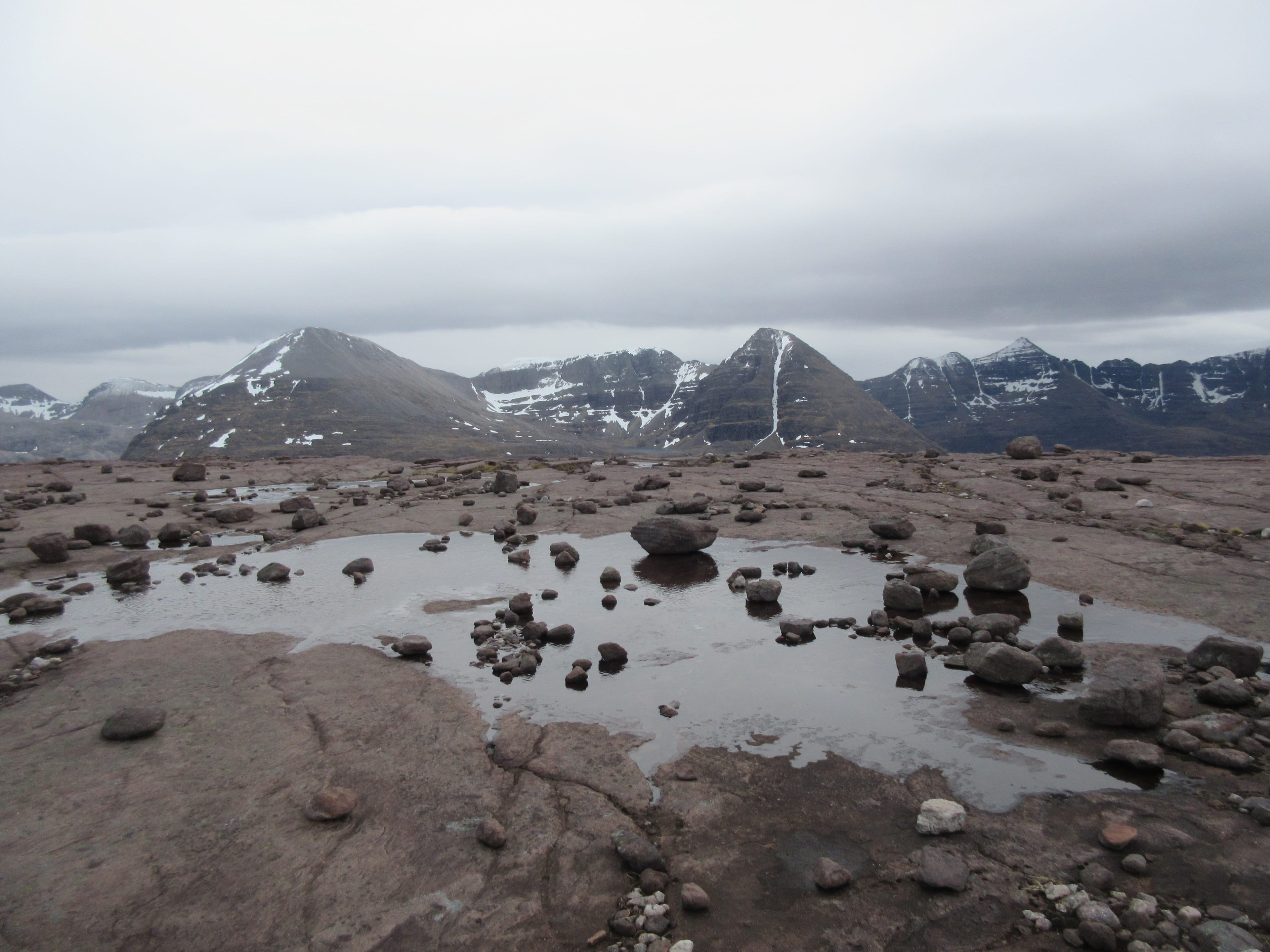 ROCK HEAVEN: Looking into Coire Mhic Fhearchair from the bizarre boulder-strewn summit of Beinn a' Chearcaill