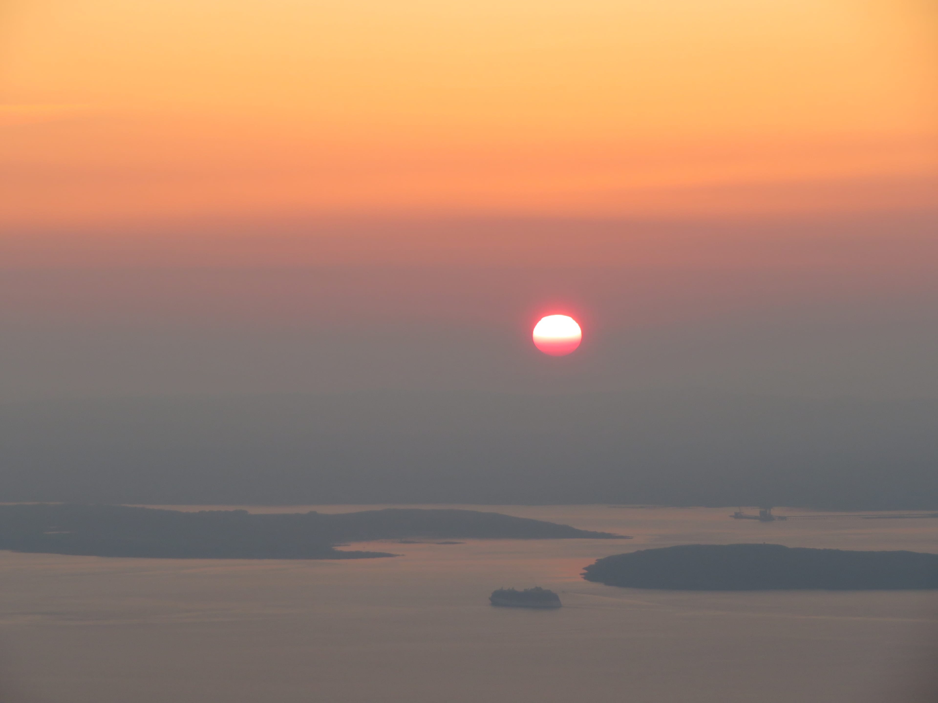FIRE IN THE SKY: Watching the sunrise from the summit of Goatfell - the best one yet on the festival night walks