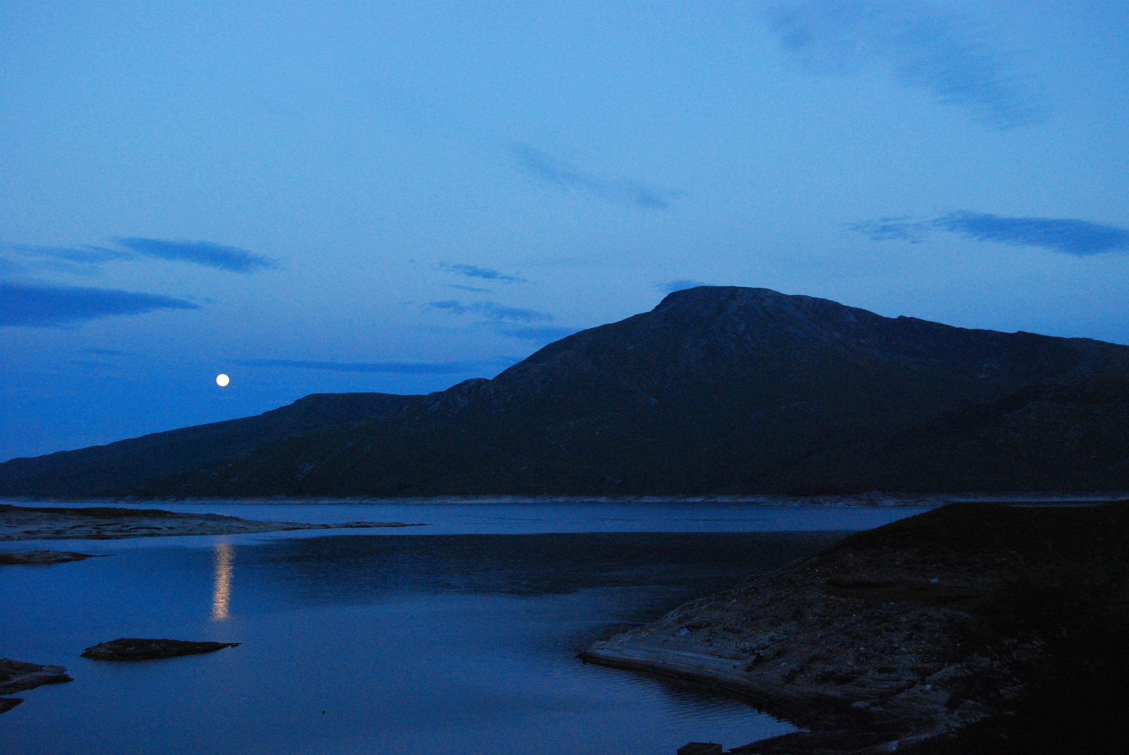 BUCK OF THE DRAW: The full moon lights up Loch Quoich as it rises behind the Munro peak of Gairich