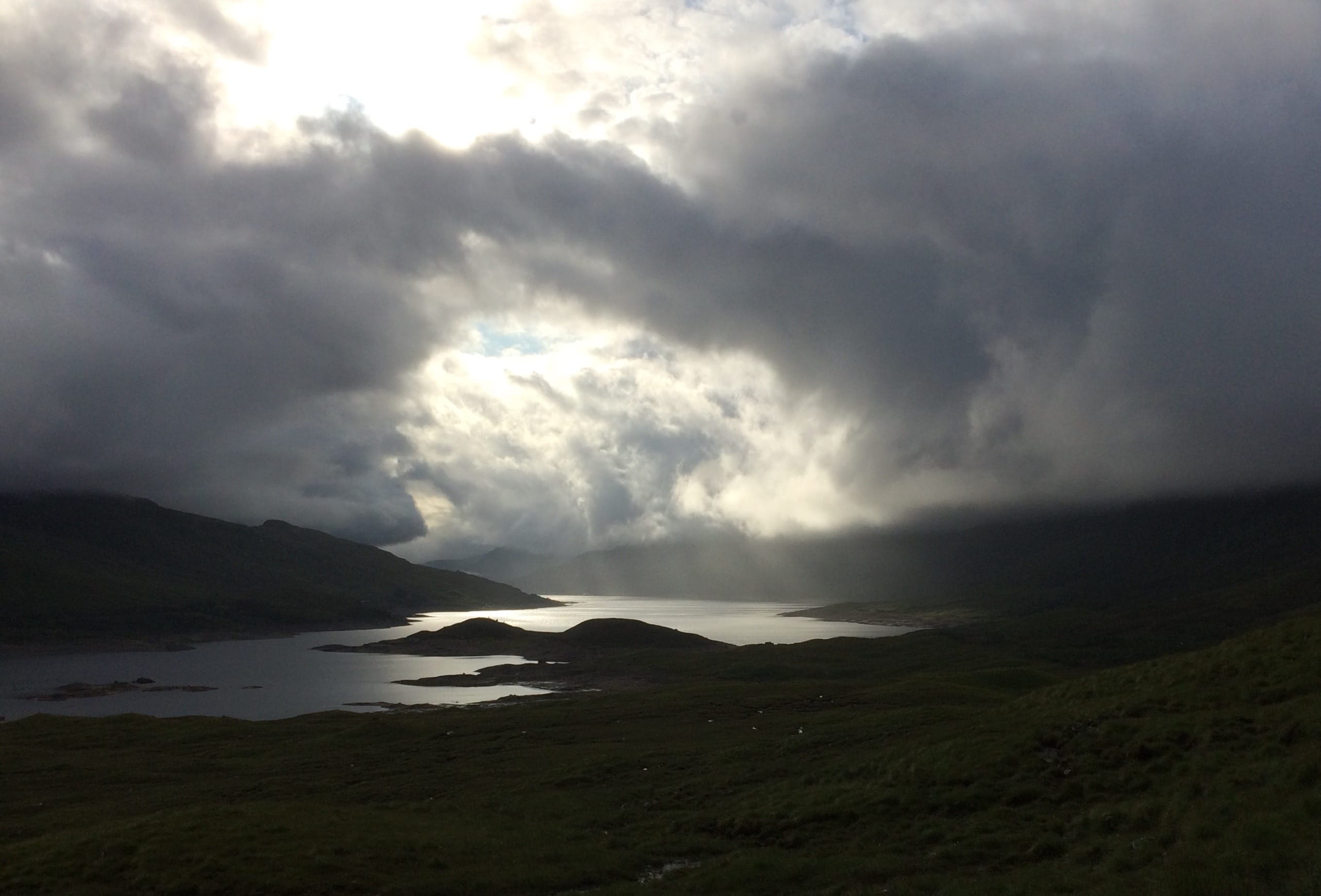 DARK ASCENT: Clouds over loch