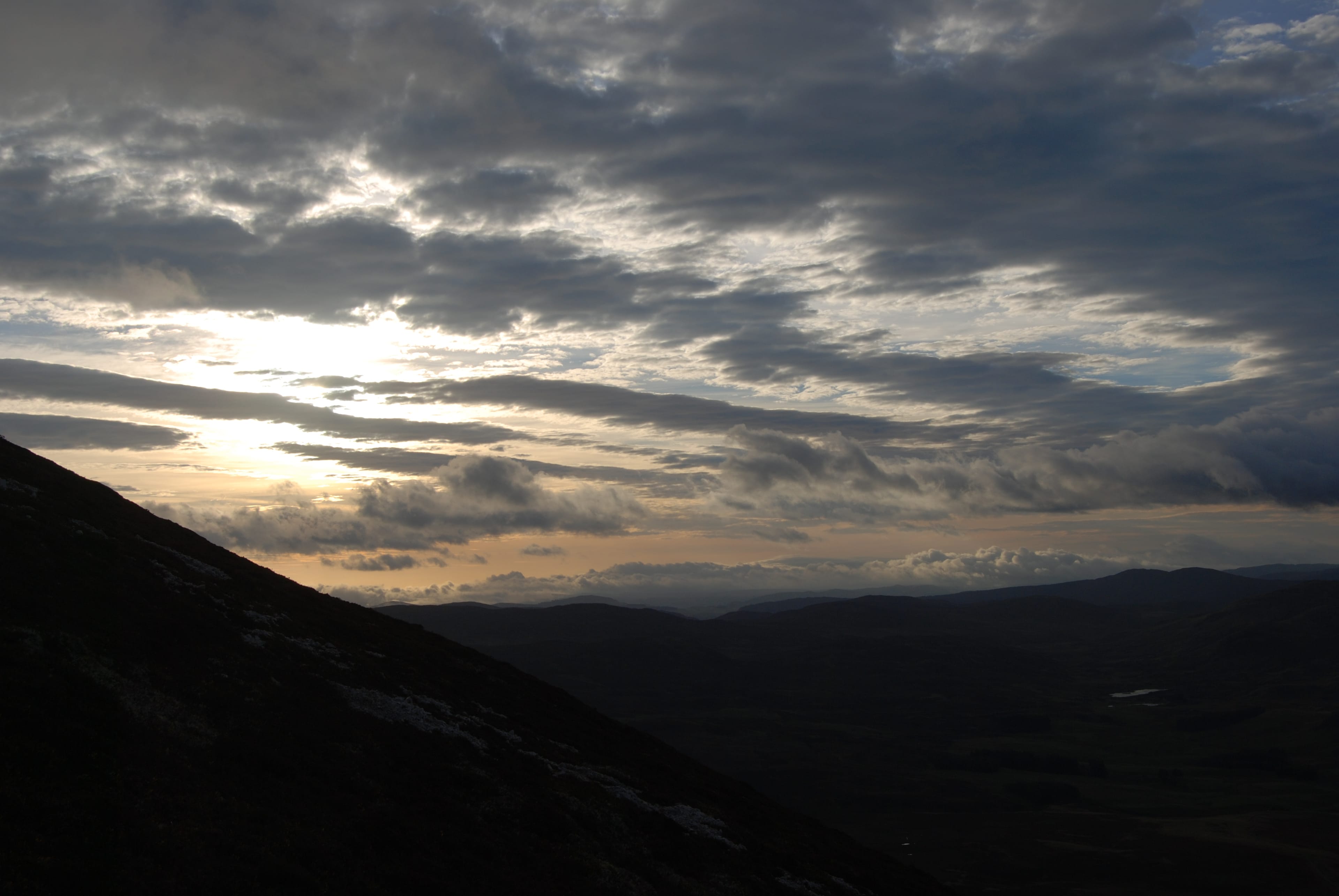 MORNING CALM: Streaked skies from Being a' Ghlo after a night spent in the mist on this triple Munro mountain