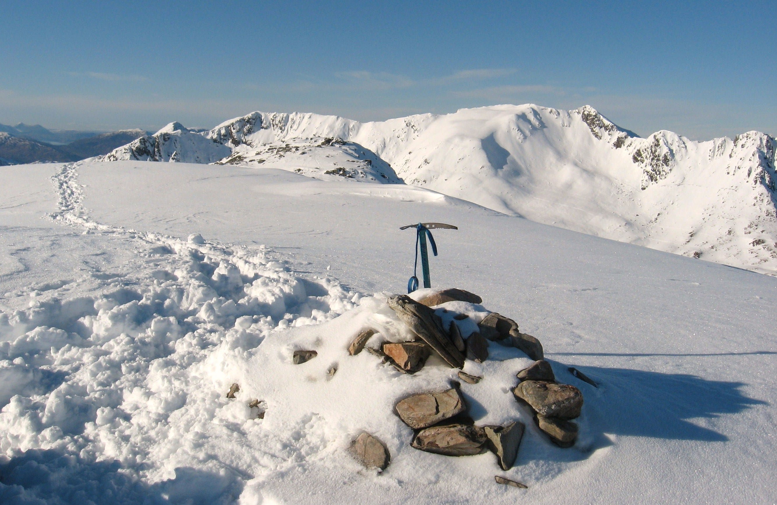 WINTER AT ITS BEST: Deep soft snow and blue sky on a perfect mountain day at the summit of Sgurr na Sgine in Glen Shiel