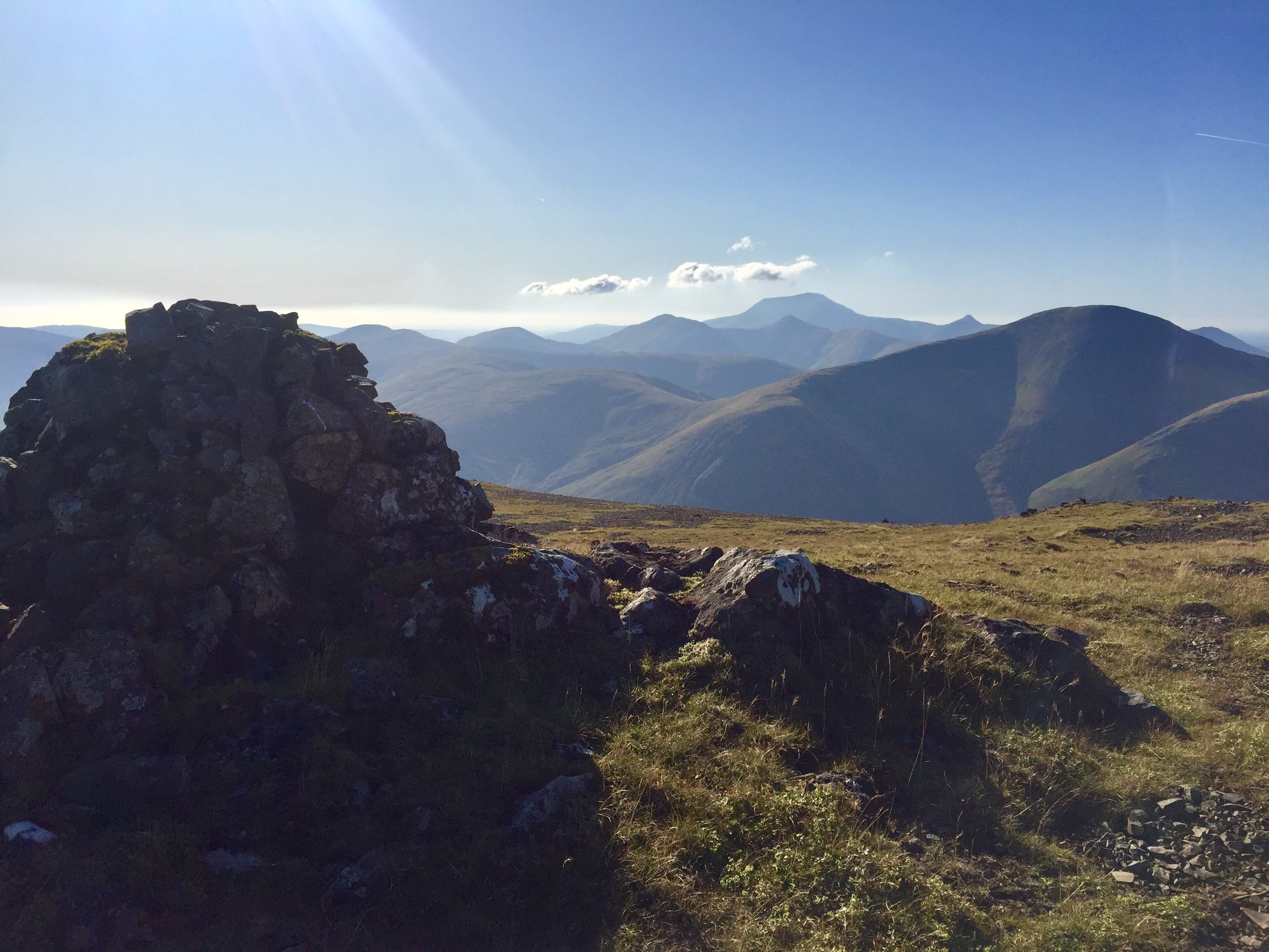 MULLING IT OVER: Blue infinity views over the island's hills from the summit cairn on the Graham, Sgurr Dearg