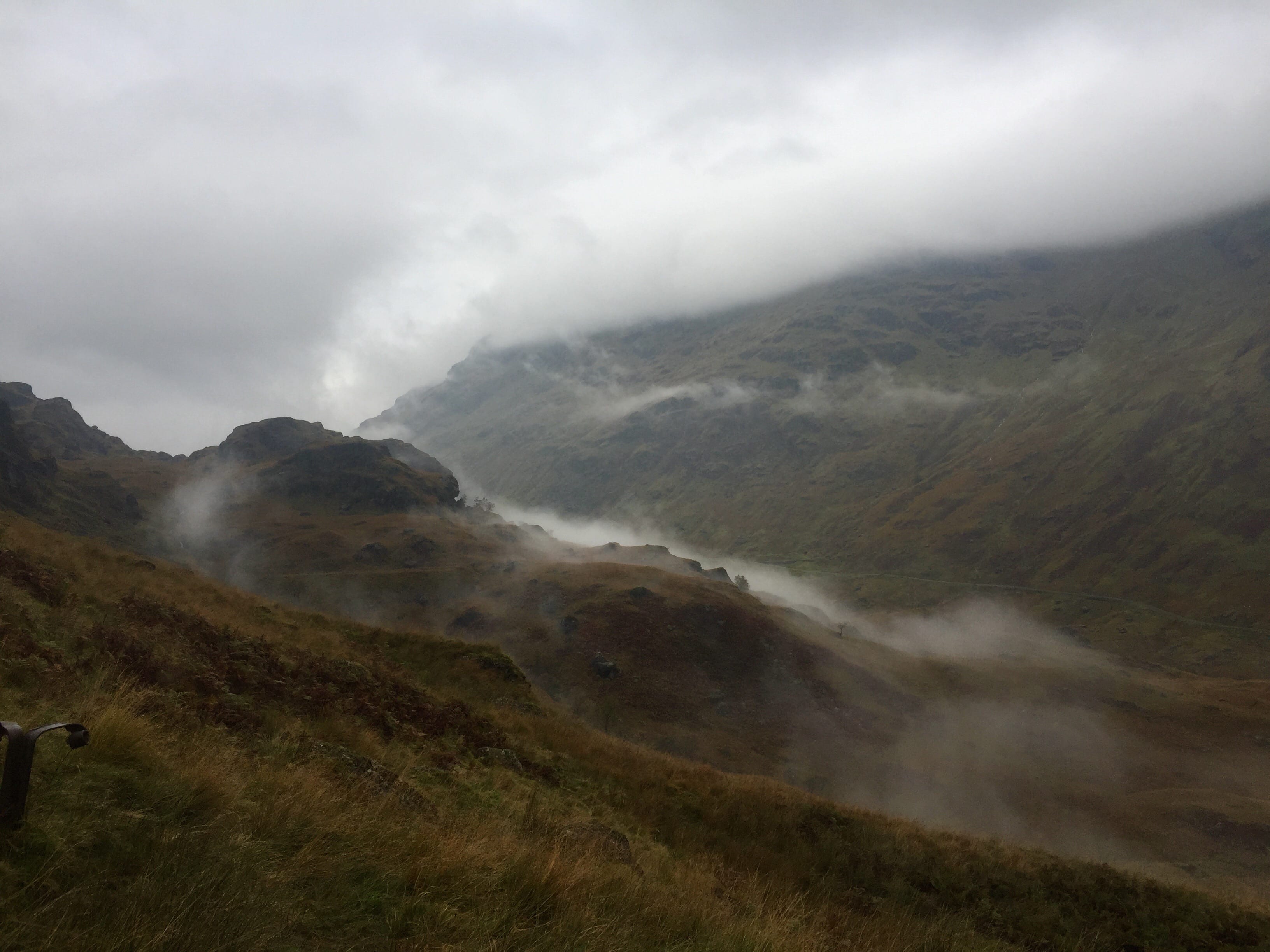 GREY BEAUTY: The morning mists swirl slowly around the slopes and tree cover during Ben Vane ascent