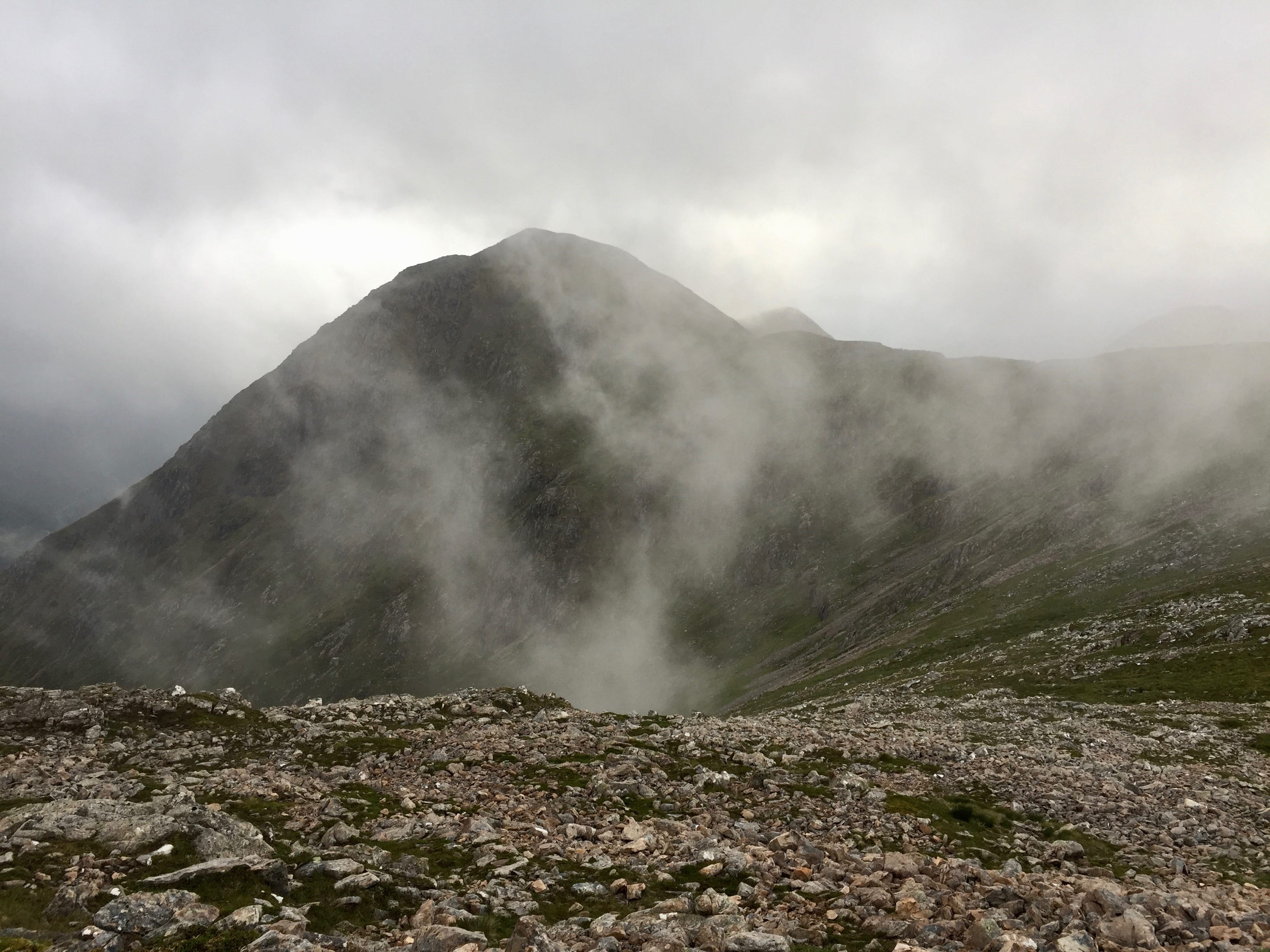 PEAKABOO: Mists swirl up and over the col providing in and out views of the adjoining summit Stob na Doire