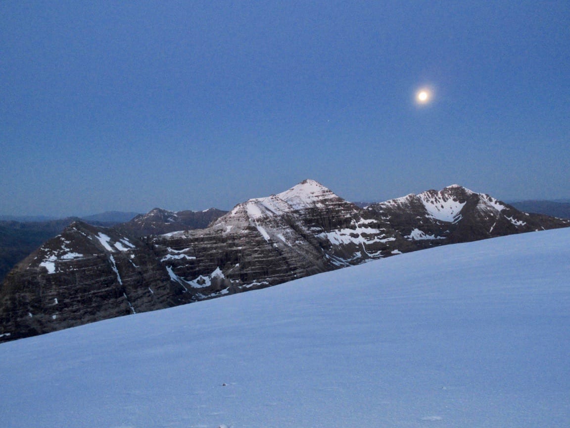 BURNING BRIGHT: The Pink Moon sits over Liathach as seen from the snow-covered ridge of Beinn Eighe