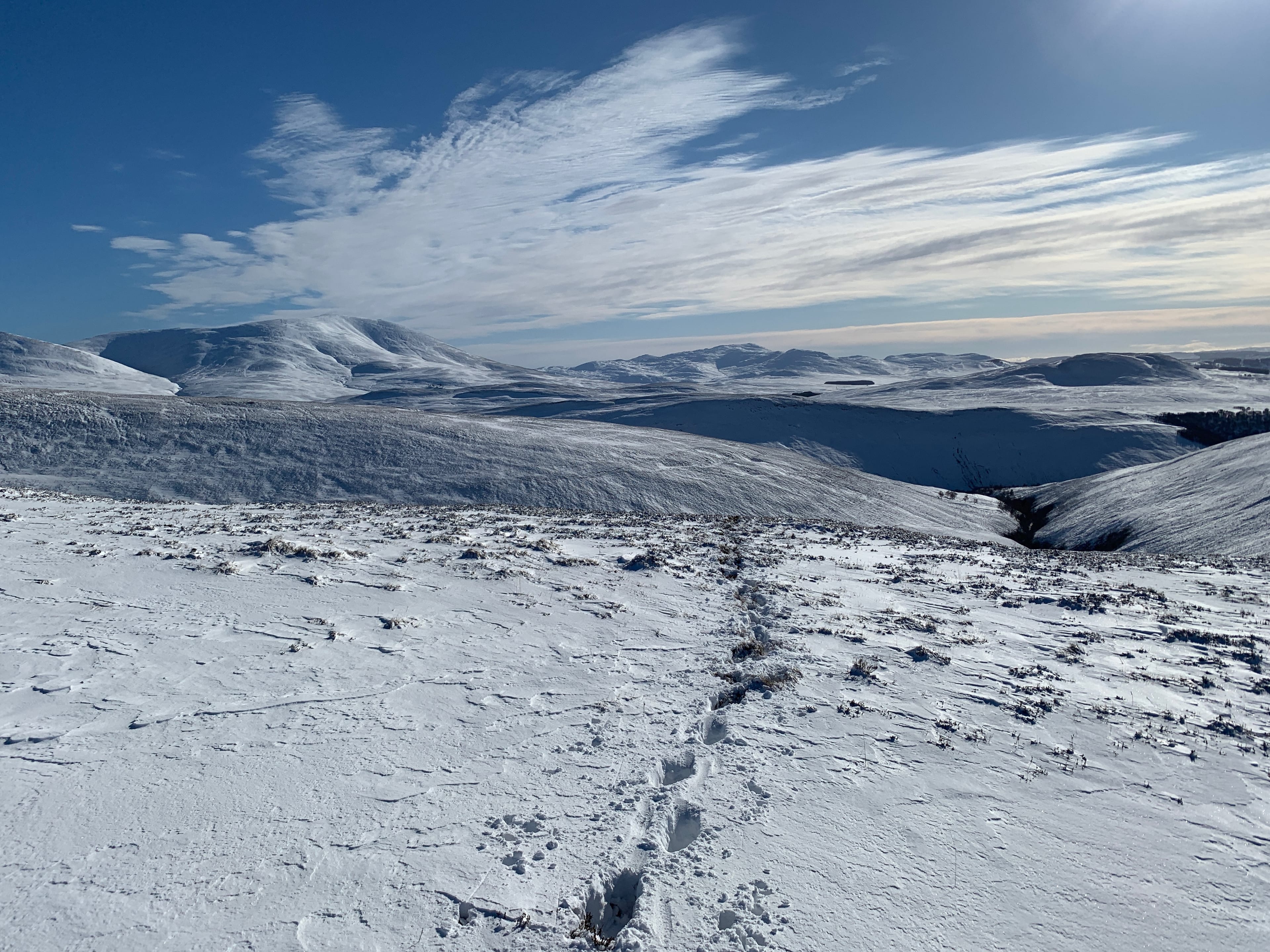 A FEW STEPS TOO FAR: Looking back to the Beinn a' Ghlo hills on a perfect day of blue and white from Beinn Mheadhonach