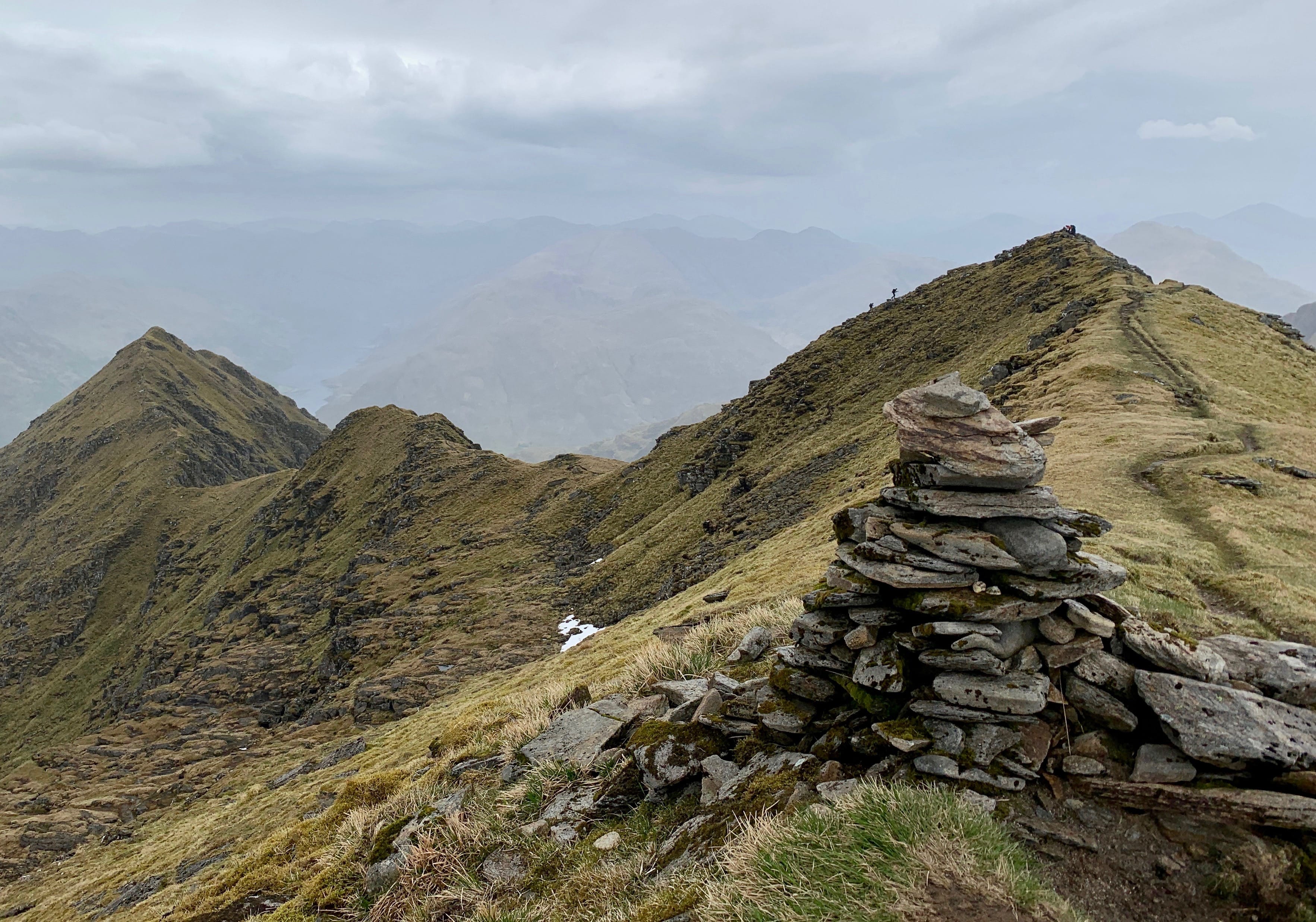 STAIRWAY TO HEAVEN: Looking along Ladhar Bheinn's summit ridge from the main top with walkers on the skyline