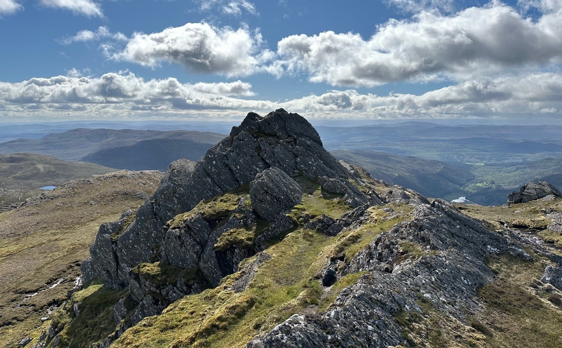 SADDLE SOAR: Looking along to the main summit rock tower of Sgorr na Diollaid in the depths of Mullardoch